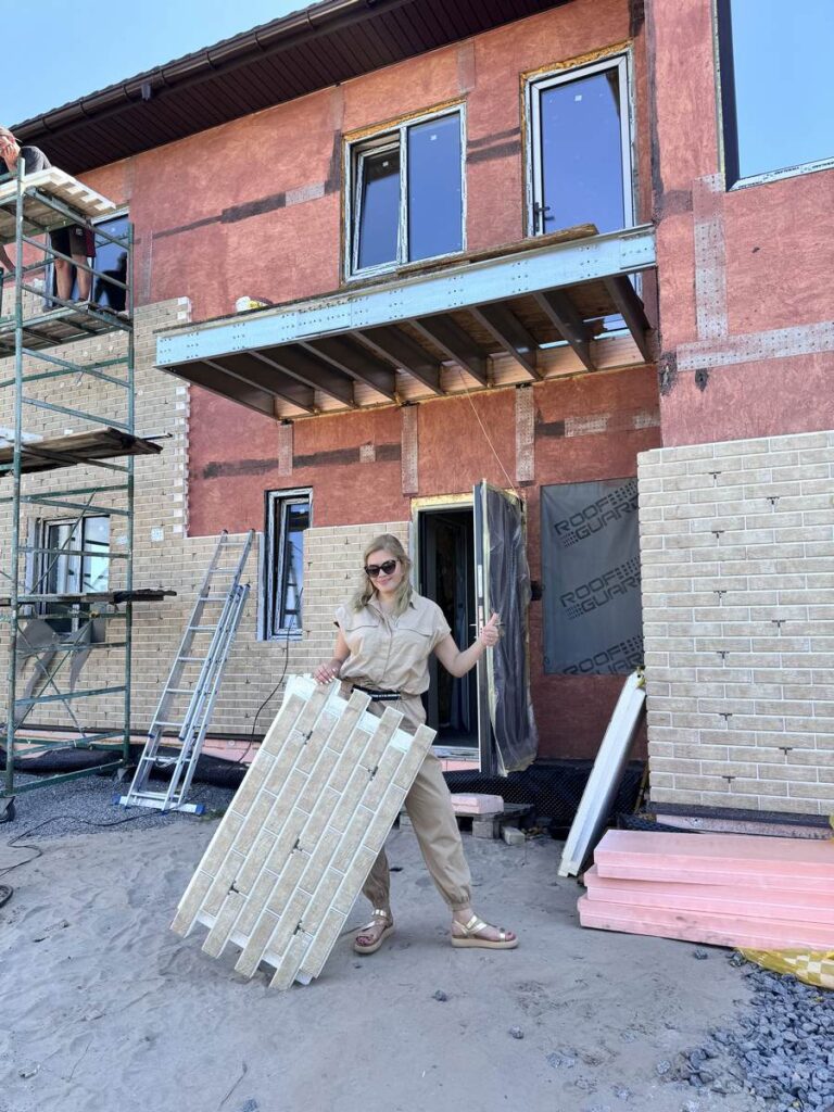 Installing Royal Facade clinker thermopanels construction site